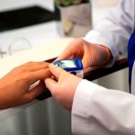 doctor-checking-patient-side-view