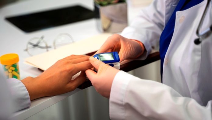 doctor-checking-patient-side-view